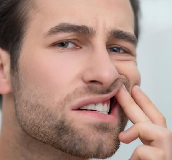 Gum holding lip with gum pain