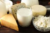 plate of milk and various cheese options