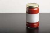 jar of unlabelled tomato pasta sauce
